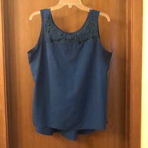 Deep teal tank with longer back.